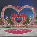 Romantic Pink Heart Shaped Arch Photo Check in Spot with Flowers Balloons and LOVE Sign