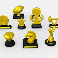 Decorative Golden Trophies And Medals With Various Shapes And Black Bases
