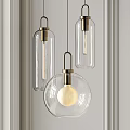 Modern Glass Pendant Lights With Metal Accents And Globe Bulbs Hanging