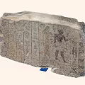 Ancient Egyptian Stone and Wood Artifact with Hieroglyphic Reliefs and Figures