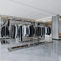Modern Clothing Store Open Layout With Metal Racks Hanging Clothes And Floor to Ceiling Windows