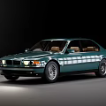 Green Classic BMW Sedan With Brown Interior Silver Wheels And Illuminated Headlights
