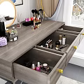 Modern Wooden Dressing Table With Open Drawers And Cosmetics On Top