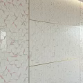 Stylish Interior Wall With Pink And White Hexagonal Marble Tiles And Gold Lines