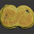 Two Golden Yellow Round Pastries With Shiny Surface And Tasty Filling