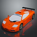Orange High Performance Race Car With Sleek Design And Rear Spoiler