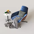 Blue Velvet Single Sofa With Plaid Cushion Gray Blanket And Small Round Table