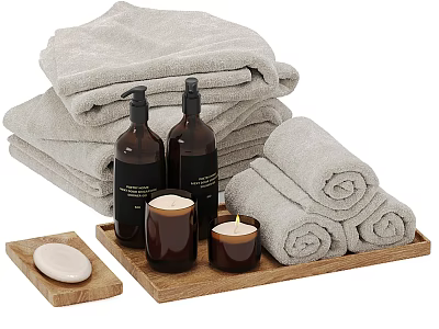 Bathroom Accessories With Gray Bath Towels Rolled Towels Dark Bottles Candles Soap On Wooden Tray 3d model