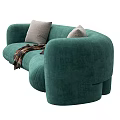Teal Curved Velvet Sofa with Gray Pillows and Plaid Blanket in Modern Living Room
