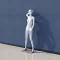White Human Sculpture With Blue Wall Background Light Colored Floor And Purple Shoes