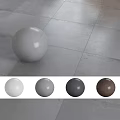 Spherical Components in Multiple Colors Displayed on Gray Tile Floor