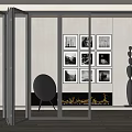 Glass Folding Doors In Modern Living Room Interior With Framed Artworks Fireplace And Accent Chair