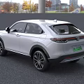 White Electric SUV With Modern Front Grille And Sleek Exterior Design