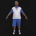 Man In Blue And White Short Sleeve Shirt Blue Shorts Gold Chain Sneakers Black Background