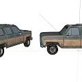 Two Vintage SUVs With Worn Out Beige Exterior Parked Face To Face