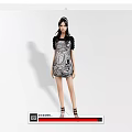 Woman in Patterned Short Dress With Black Top Brown Sandals on White Background