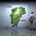 Man Viewing Green Jiangxi Province Topographic Map Wall Decor in Interior 3d model