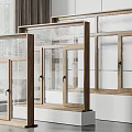 Modern Interior Display Of Wooden Window Frames With Glass Panels And White Bases