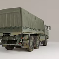 Military Off Road Cargo Truck With Green Canvas Covered Bed And Multiple Wheels