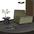 Green Velvet Modern Single Sofa With Small Round Table Green Plant And Wooden Floor