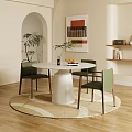 Modern Round White Dining Table Set With Green Chairs Rug Plant And Wall Art