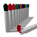 Various Colored Markers with White Barrels Arranged in a Row Red Cap and Lying Marker