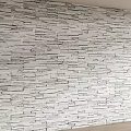 Gray Textured Stone Background Wall With Layered Bricks For Modern Interior Design 3d model