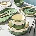 Green and Cream Ceramic Dinnerware Set with Bowls Plates Utensils and Rosemary Decor