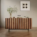 Wooden Ribbed Console Cabinet With Decorative Vase Green Plant Photo Frame And Books