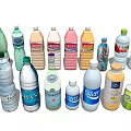 Various Brand Drink Bottles Including Mineral Water And Fruit Juice With Different Colors And Sizes