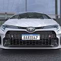 White Toyota Sporty Car With Aggressive Front End And Aerodynamic Features