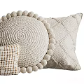 Neutral Knitted Round Pillow With Pom Pom Edges And Woven Textured Square Pillows