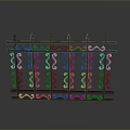 Black Iron Fence With Pointed Tops And Intricate Decorative Patterns
