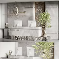 Modern Reception Area with Stone Desk Wall Two Computers Decorative Elephant Sculpture and Green Plant