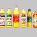 Various Cooking Oil Bottles with Colorful Labels and Yellow Liquid in Kitchen