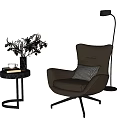 Brown Armchair With Black Side Table Vase Plants And Floor Lamp
