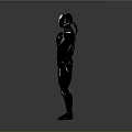 Futuristic Game And Movie Character In Black Combat Suit Standing With Hands On Hips