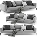 Modern Gray Three Seater Sofa With Plaid Throw And Multiple Cushions 3d model