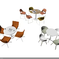 Colorful Modern Table and Chair Sets With Round Tables and Multicolored Chairs