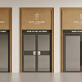 Double Doors at Ice Coffee Factory with Glass and Signage Displaying Enter To The Factory