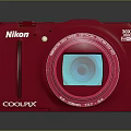 Shopping Mall Store Showcases Red Nikon Camera With 30x Zoom Lens