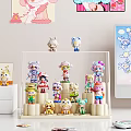 Transparent Figure Display Cabinet With Various Anime Character Figures On Layered Shelves