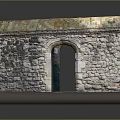Arched Stone Built Entrance Gate With Green Door And Mossy Roof On Stone Walls