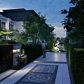 Serene Garden Landscape with Patterned Stone Pathway Hedges Trees Sculpture and Evening Lighting
