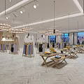 Elegant Clothing Store With Circular Chandeliers Herringbone Floor Large Windows And Clothes On Racks