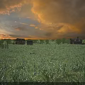 Beautiful Golden Sunset Rural Landscape With Vast Green Meadow Old Rustic Houses And Distant Trees