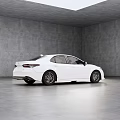 White Sedan Side View In Spacious Gray Background With Black Wheels And Sleek Body Lines