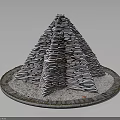 Stone Pyramid Architectural Structure with Stacked Stones on Circular Base Surrounded by Gravel