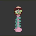 Pink Base Candy Dispenser With Silver Spring And Colorful Candies In Glass Globe
