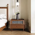 Brown Wooden Bedside Table With Vase White Flowers In Light Wall Bedroom Interior